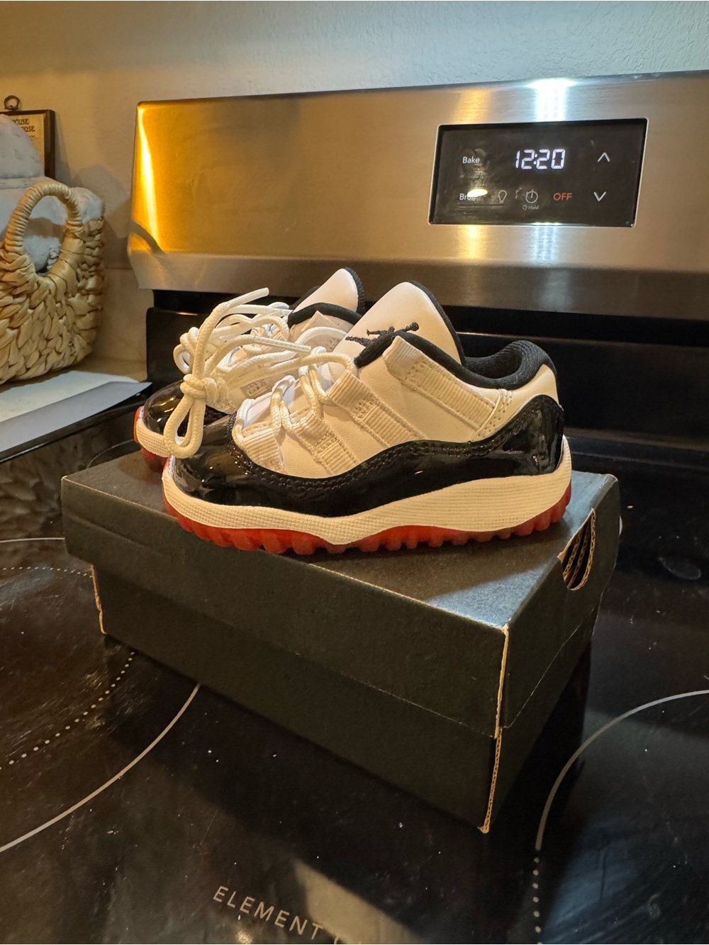Jordan 11 Retro Low Kids Low-Top Sneakers in White, Black and Red